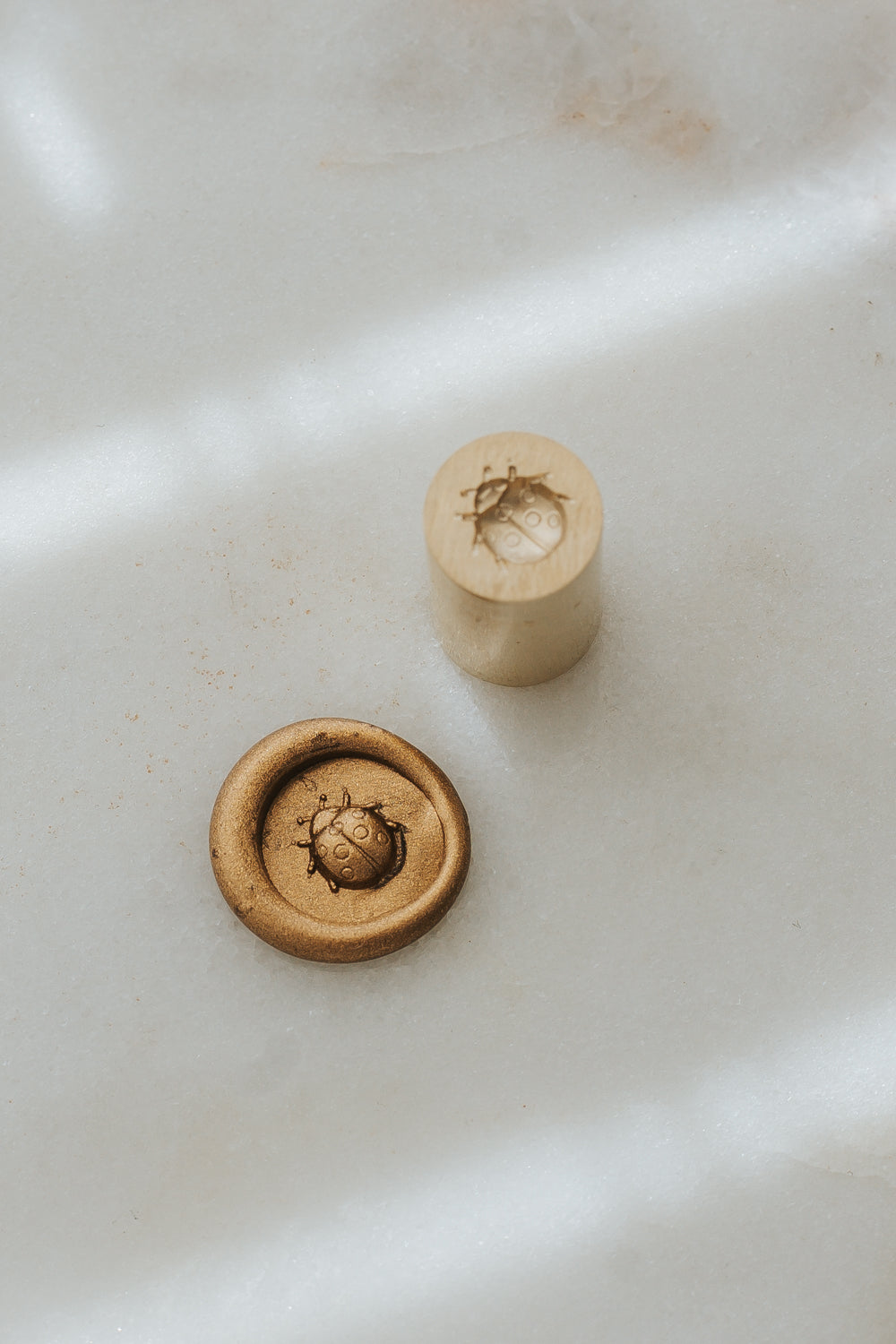 Ladybug wax seal stamp with metallic gold wax seal