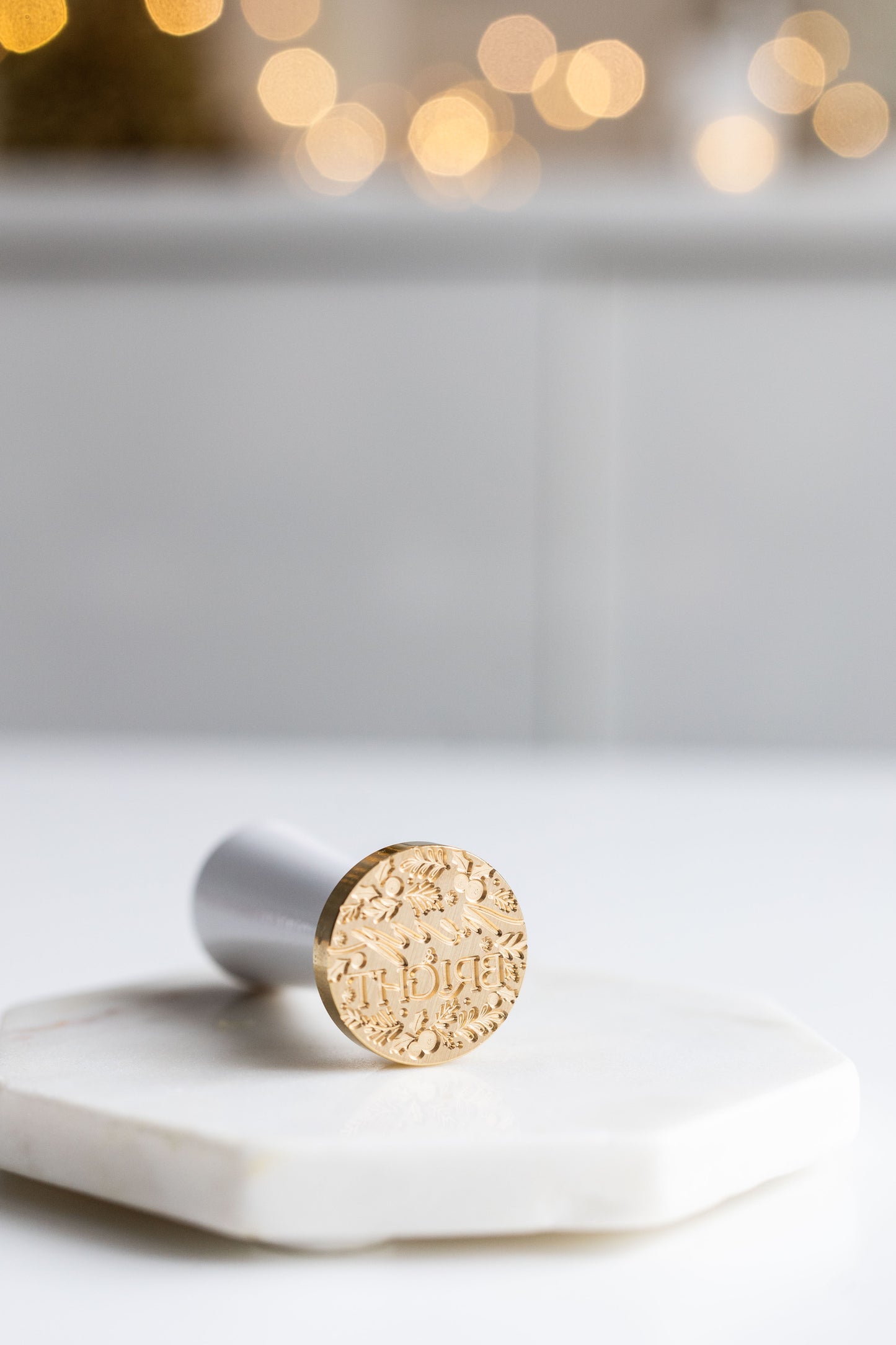 Holiday wax seal stamp brass head with floral wreath design and script text for sealing wax impressions