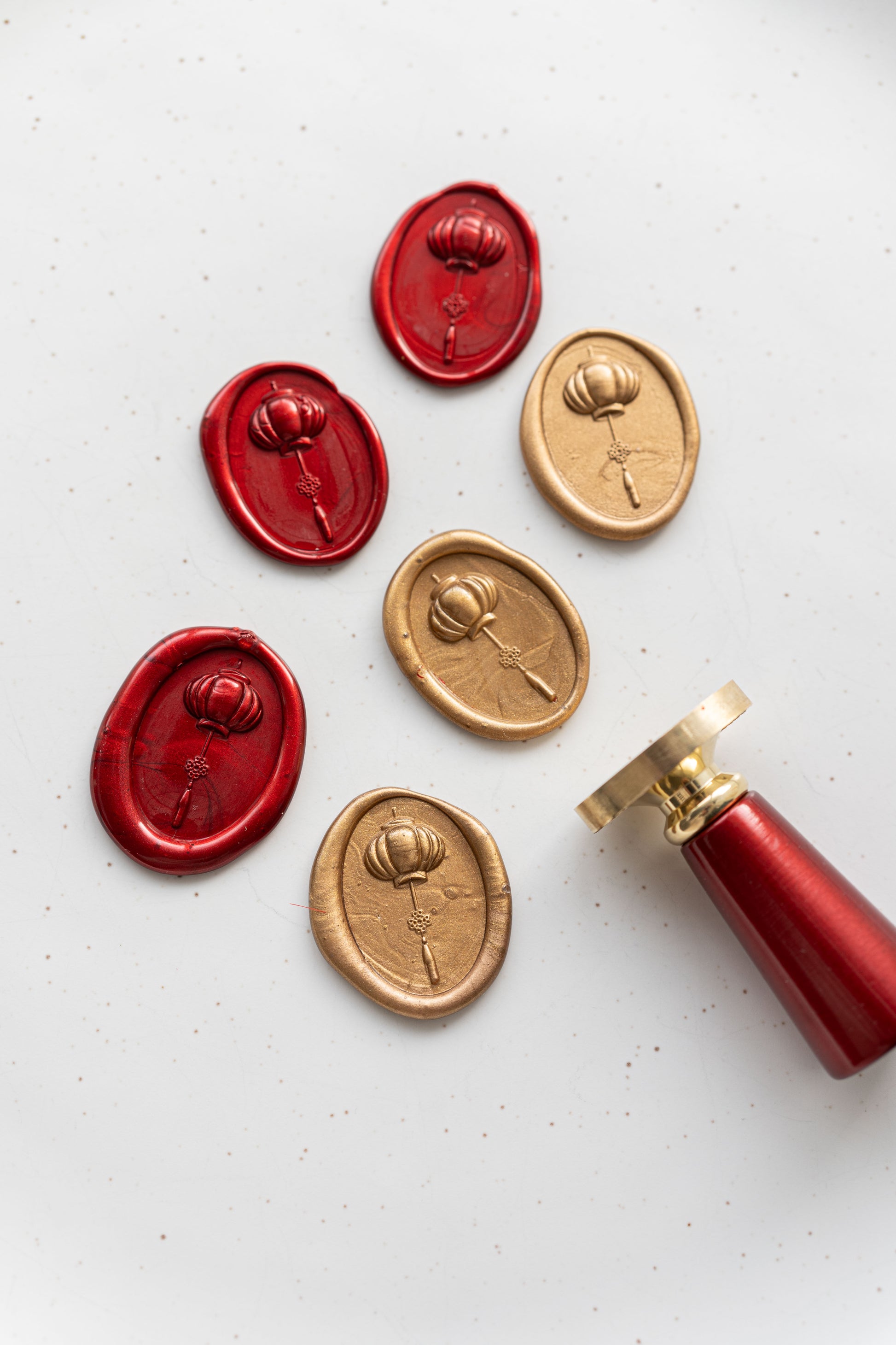 Red and gold wax seals with Chinese lantern design for Lunar New Year envelopes and stationery
