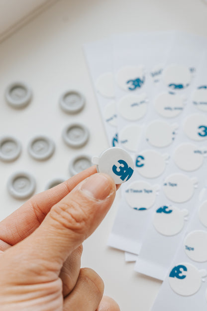 Close up of wax seal adhesive sticker backing, easy peel double sided adhesive for wax seal application