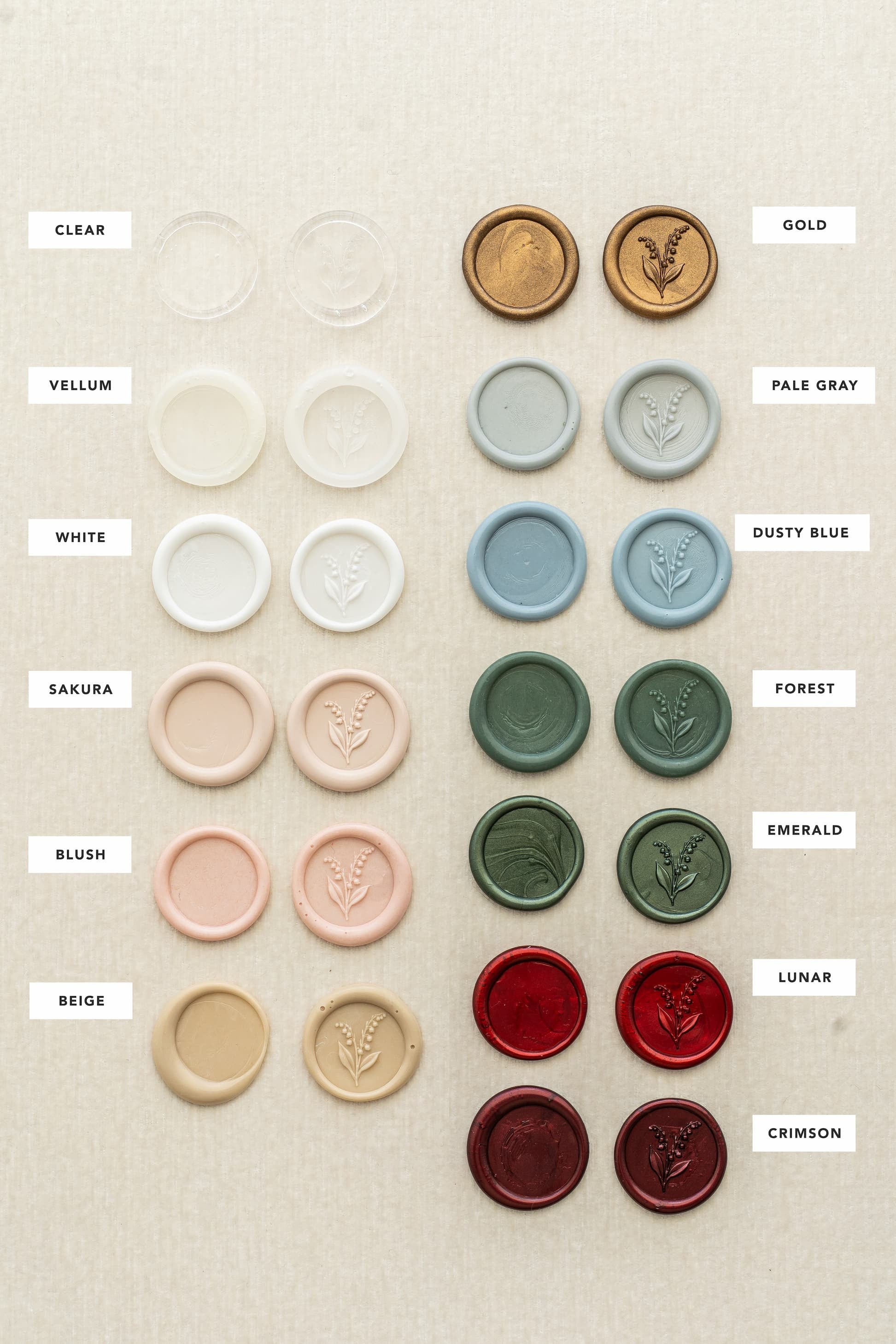 Wax seal color chart featuring clear, vellum, white, blush, gold, forest, emerald, lunar red, and crimson sealing wax.