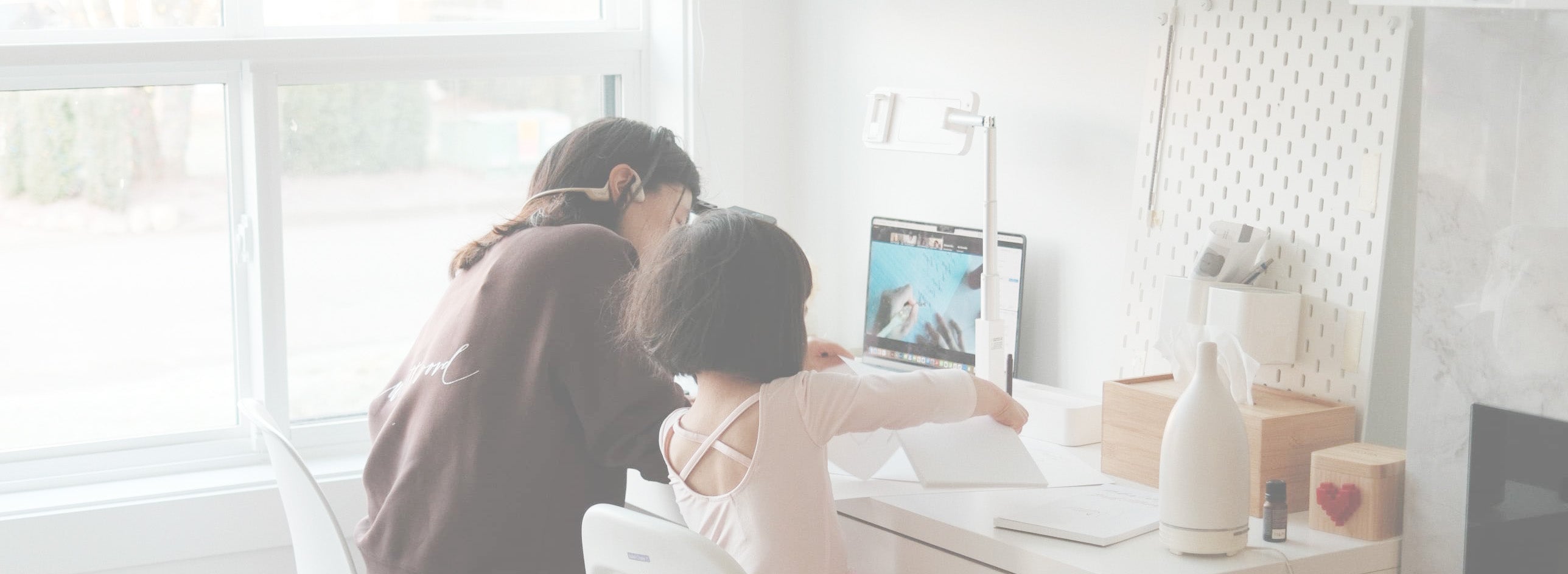 Karla and her daughter enjoying creative lettering time together through an online modern calligraphy course from home.