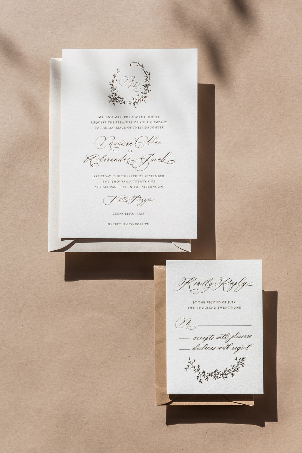 Elegant wedding invitation and RSVP card set with modern calligraphy, neutral tones and luxury paper texture