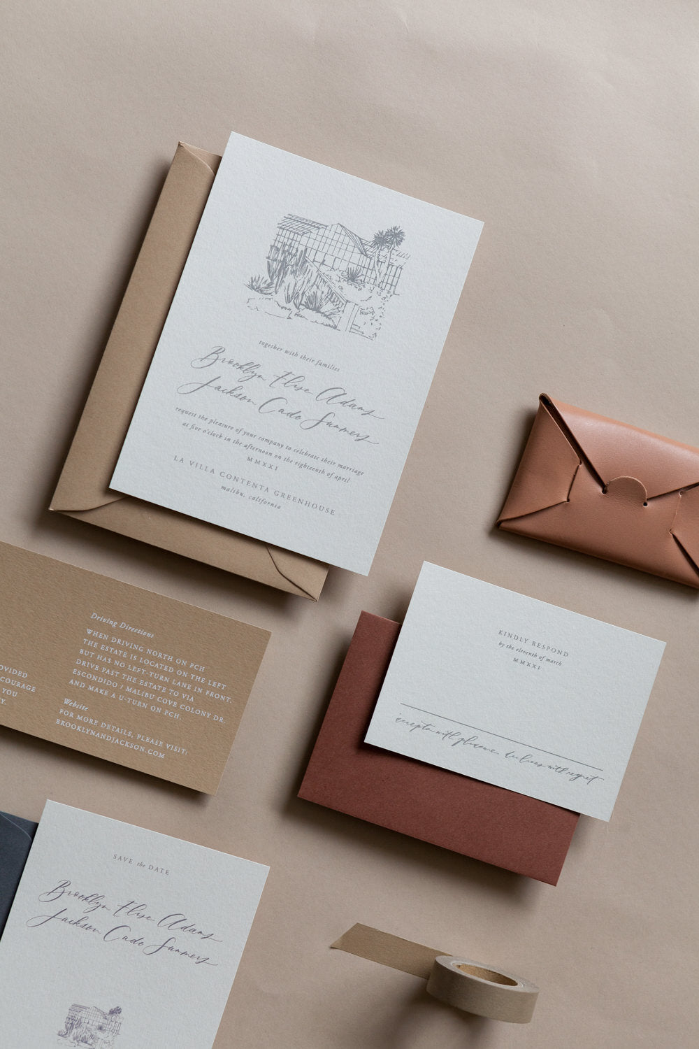 Neutral wedding invitation suite with RSVP card and custom venue illustration