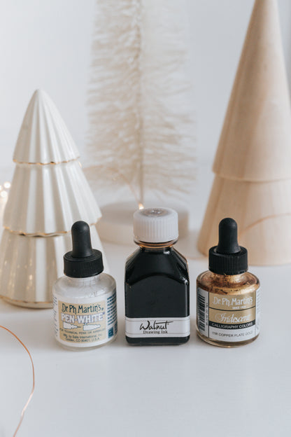 Dr. Ph. Martin's Pen-White, Walnut Drawing Ink, and Iridescent Copper Plate Gold ink bottles