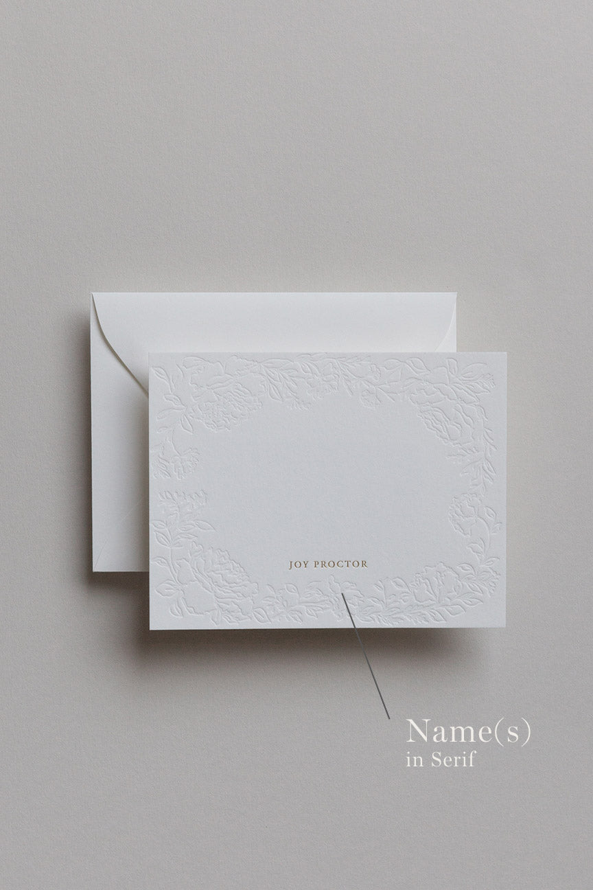Minimal stationery set with embossed card, envelope, ruler, and neutral tools