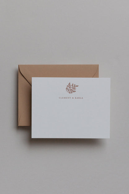 Minimal personalized stationery set with names in serif font on card and kraft envelope