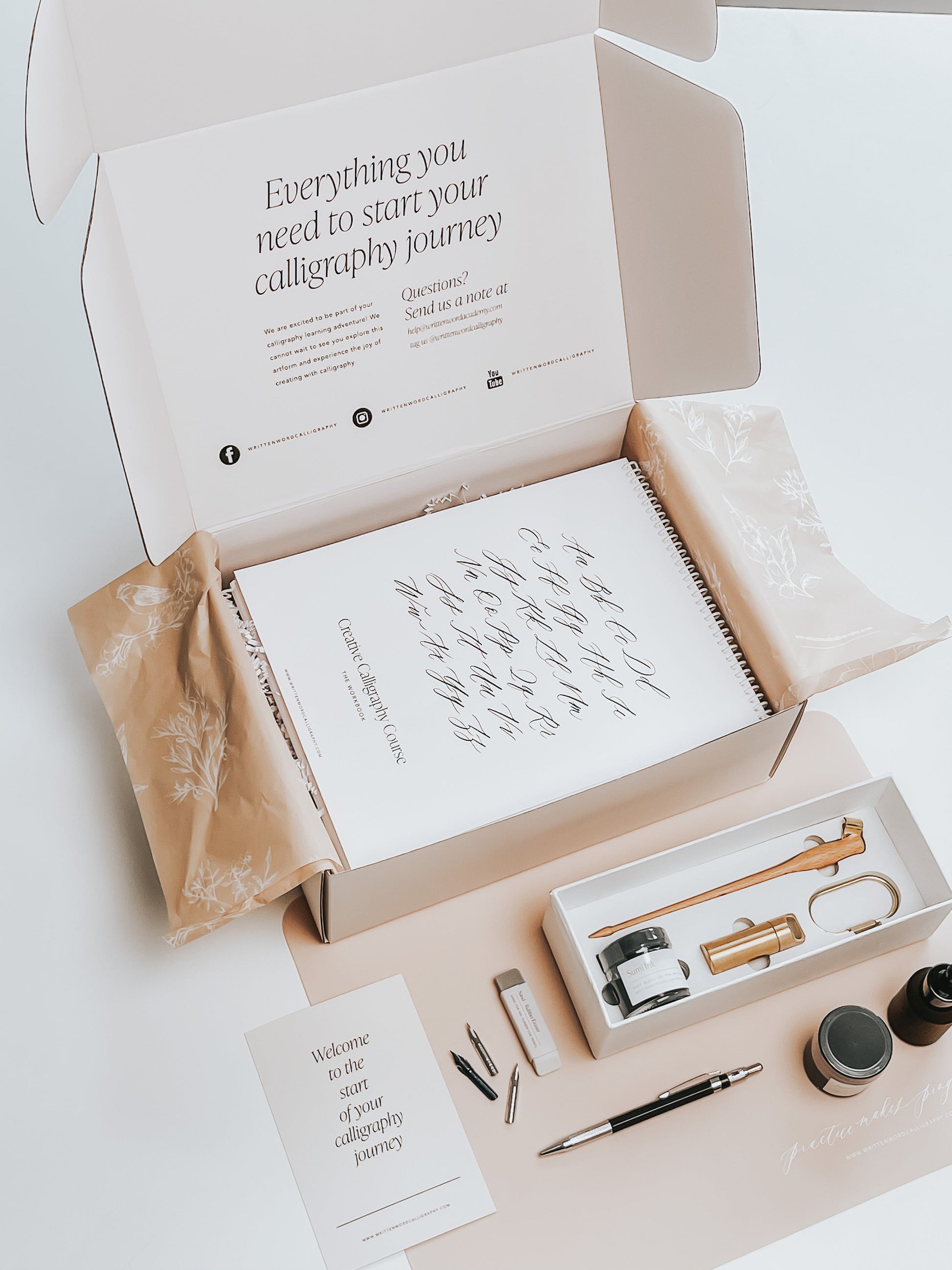 Calligraphy starter kit with guide, ink, nibs, pen holder, and tools to begin your calligraphy journey