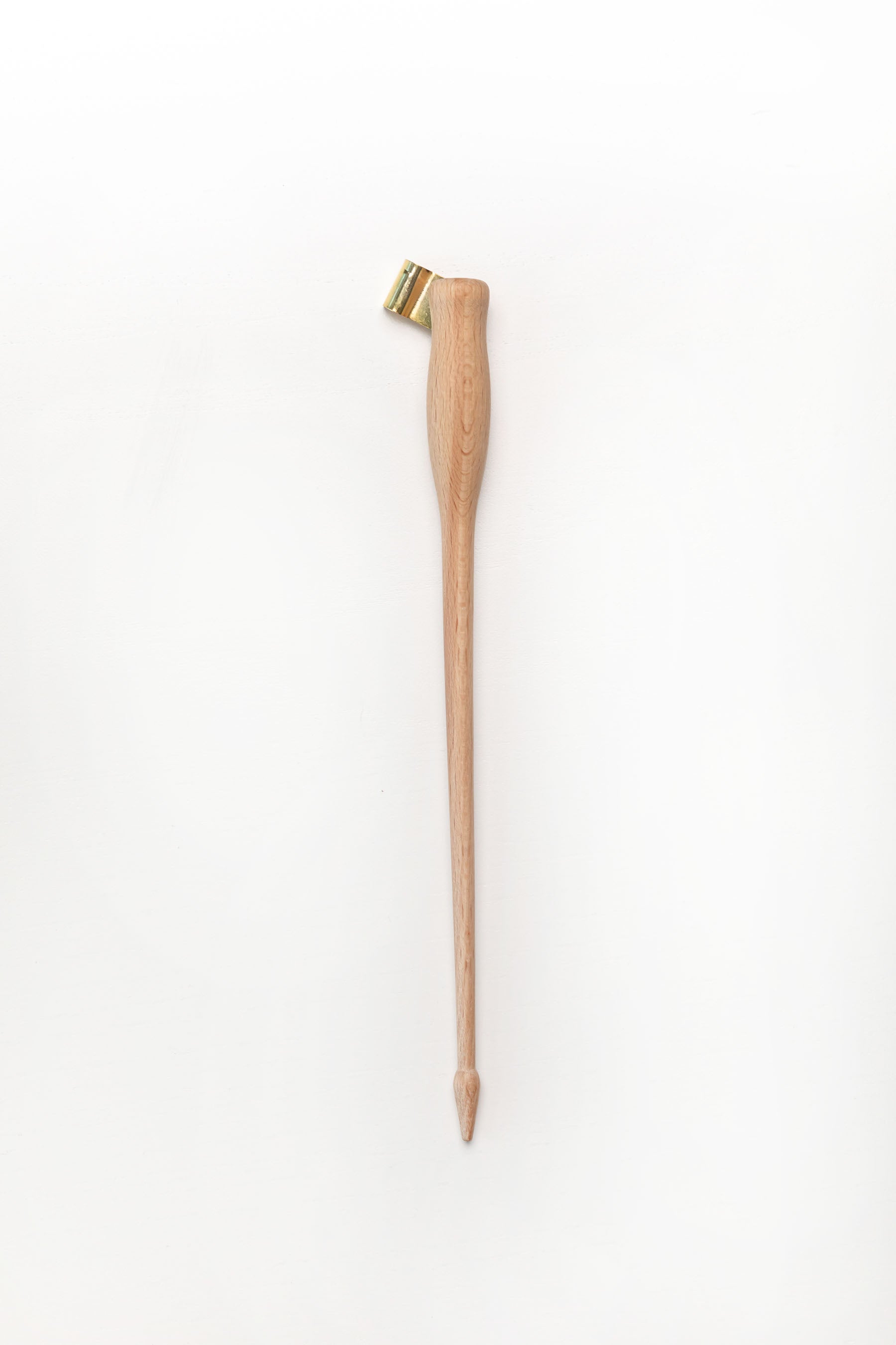 A wooden oblique calligraphy pen with a brass flange, displayed on a clean white background