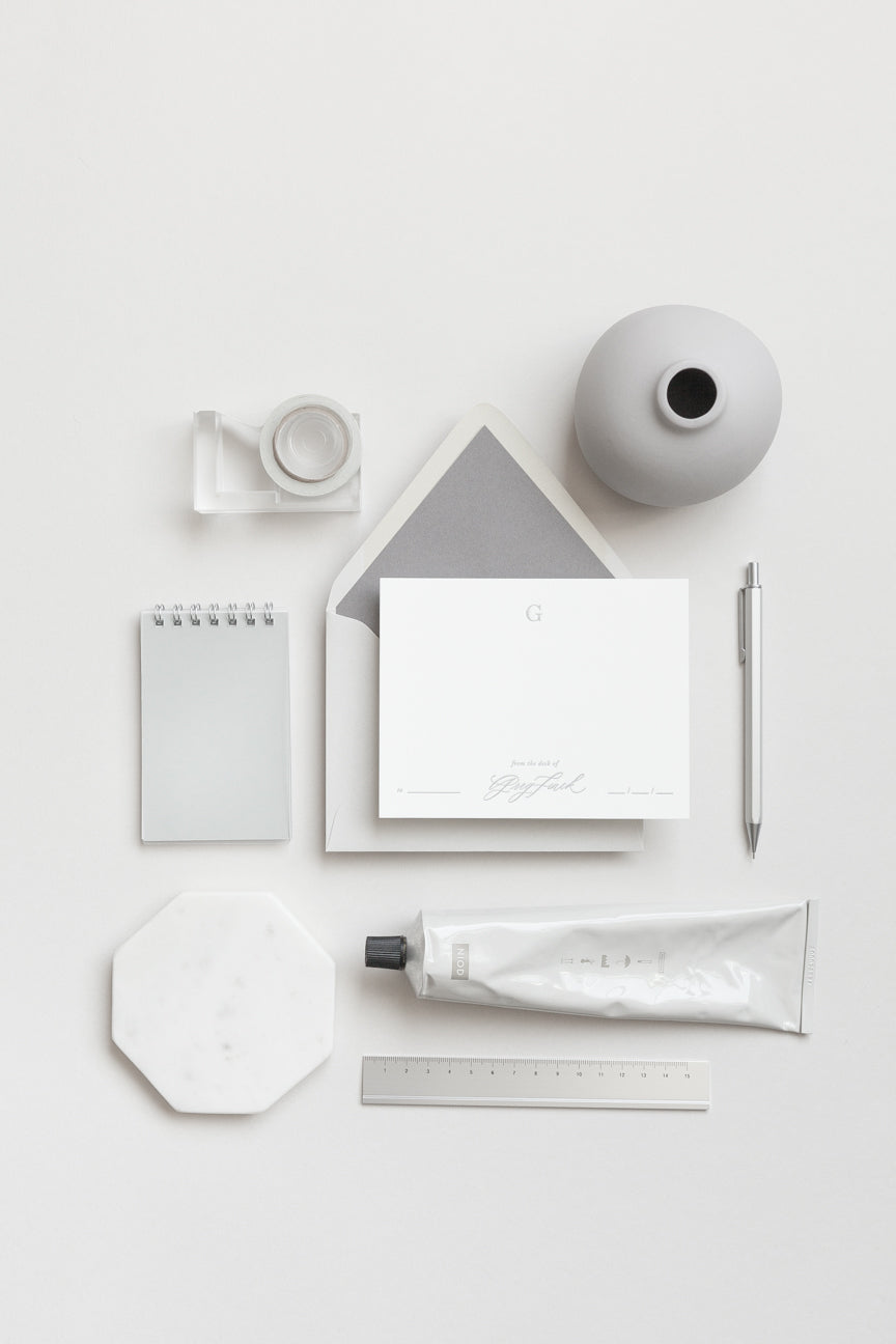 Personalized stationery set with envelope, card, pen, tape, notebook and minimalist desk accessories